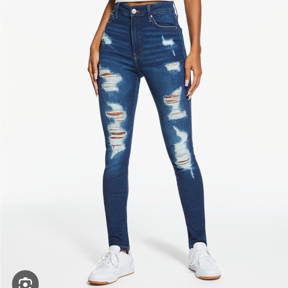 Distressed Blue Denim Jeans